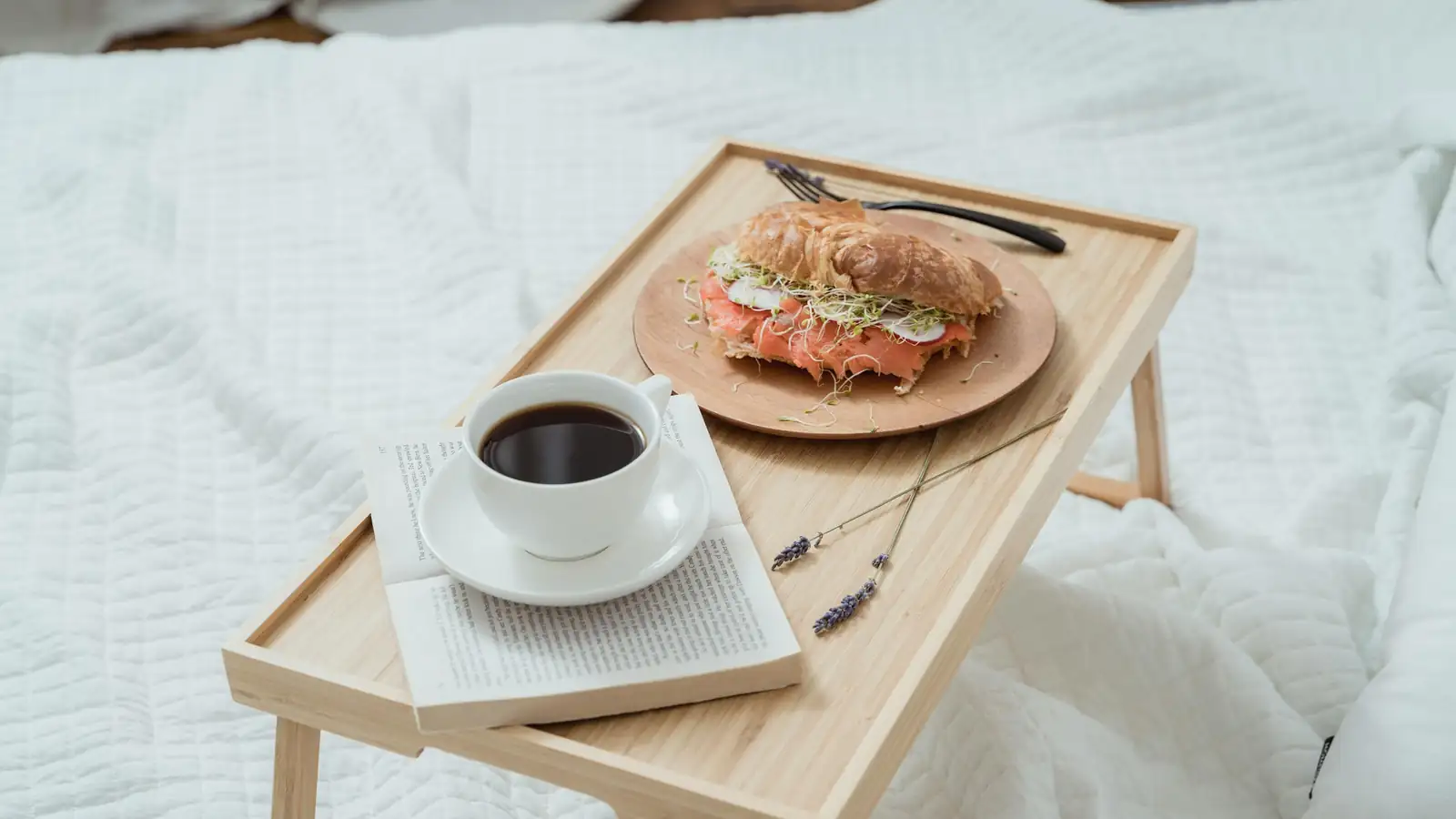 Bamboo serving tray with breakfast